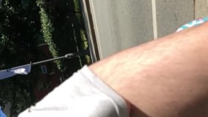 Walking in public in short, grey shorts