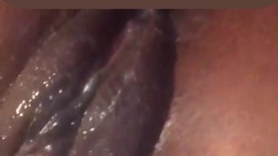 Ms Chocolate plays with her wet pussy