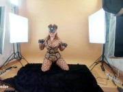 Backstage from fetish photosession, spandex leopard print catsuit and leather thigh high boots 7/16