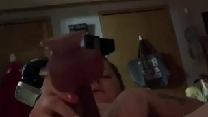 Thick girl with a big dildo.