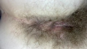 super hairy girl with big clit fucks her pussy with dildo