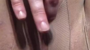 Pussy play through pantyhose