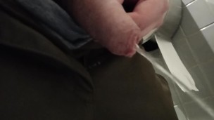 Uncut dick pissing in public toilet