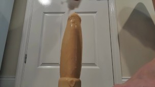 Gay lad takes monster dildo, twink riding large dildo, anal stretching, anal gaping.