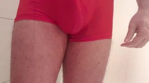 Red tight underwear pissing in the shower