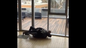 wetsuited silicone masked guy cums on his dummy at patio windows