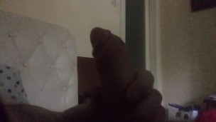 Masturbating