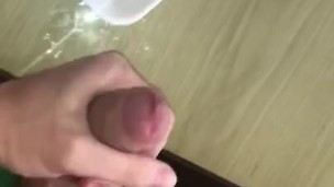 Adding the sauce to her snack