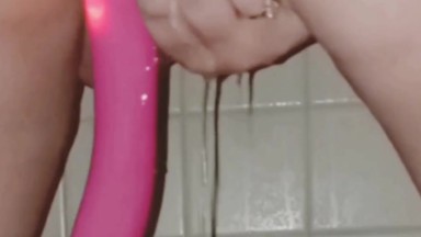 Horny teen squirting with orgasms while vibrating her clit  in the shower!