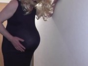 pregman. I walk in my home with my huge belly