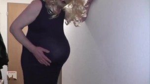 pregman. I walk in my home with my huge belly