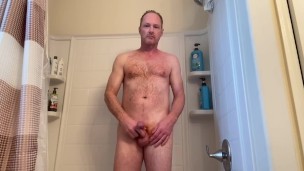 Messing around in the shower then jacking off and cumming on my ginger pubes