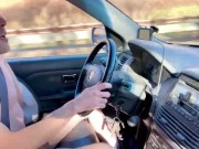 Flashing and stroking a big cock on the highway