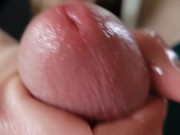 She squeezed the greased up penis to the brink during this impressive handjob clip. 10/16