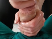 She squeezed the greased up penis to the brink during this impressive handjob clip. 8/16