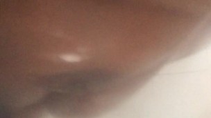 Black BBW washing her tits