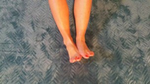 Cutie puts lub on her feet and plays with them FOOT FETISH