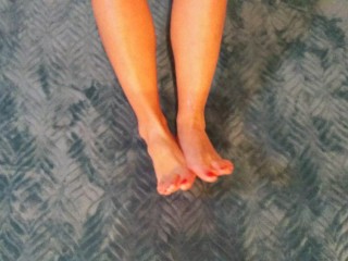 Cutie puts lub on her feet and plays with them FOOT FETISH