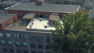 Piper flying drone on rooftop