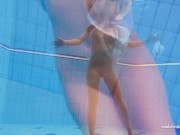 Big tits brunette babe Zuzanna swimming in the pool 9/16