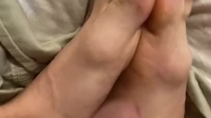 Playing with my sweaty feet after a long day.