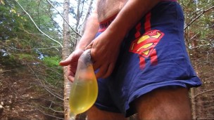 Pissing in a Condom in Superman Undies