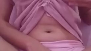 Sexy asian girl rubbing panties and teasing her tits