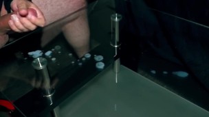 Blowing out cum on my glass table!