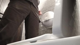  Toilet cam. Pissing in a public toilet