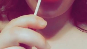Sucking on a lollipop just for practice