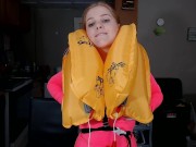 Inflating an Airplane Life Vest 13/16