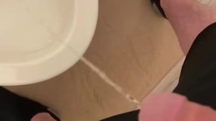 Uncut cock pissing