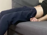 Wanking in jogging bottoms, my big cock cumming.