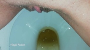 Piss in toilet. Washing hairy Pussy in period days. Close up. 