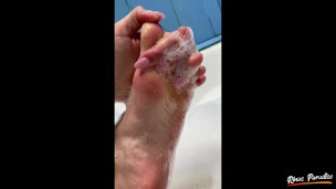 show and caress my feet in the bathroom. Soft and gentle feet in foam