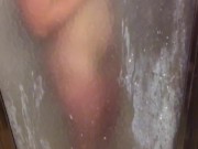Watching her shower, she briefly presses her tits & ass on the glass door to tease me with her body 