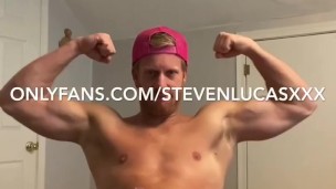 Hot stud jerks cum into condom 