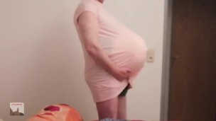 pregman. walk with triplet belly