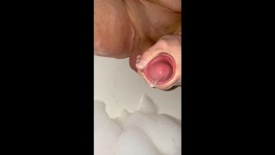 Jerking big cock and cum in hotel jacuzzi tub
