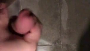 Stocky guy wanking his thick cut cock in the shower with big cumsot