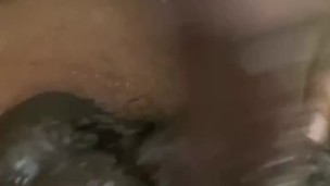Taking a shower playing while stroking my big black cock 