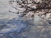 Winter city across the river. 1/16