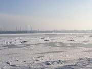 Winter city across the river.