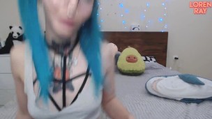 Beautiful Girl With Blue Hair Playfully Sucks A Big Dildo That Cums On Her Face