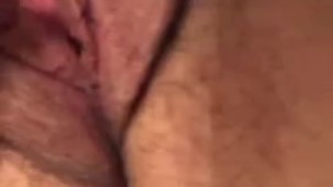 Masturbating