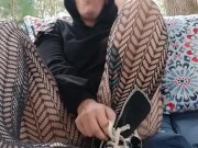 Smokes a cigarette and teases with fishnets and daisy dukes outside 5/16