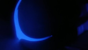 Crossdresser under UV light 