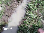 Bare feet in mud