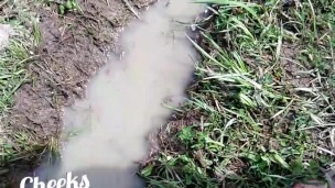 Bare feet in mud