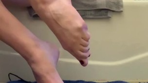 Tall Blonde Babe Massages Feet and Tries On Socks